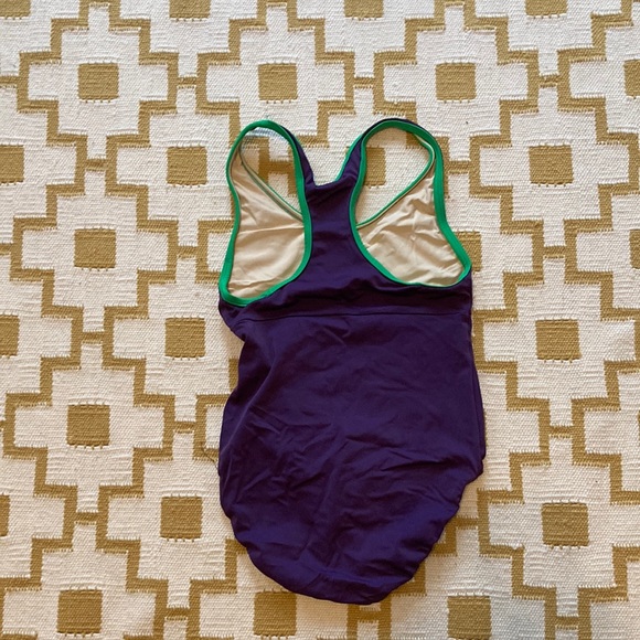 Adult M Class-In Racerback leotard. Purple with green trim. - Picture 2 of 3